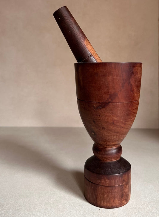 Vintage wooden mortar and pestle.