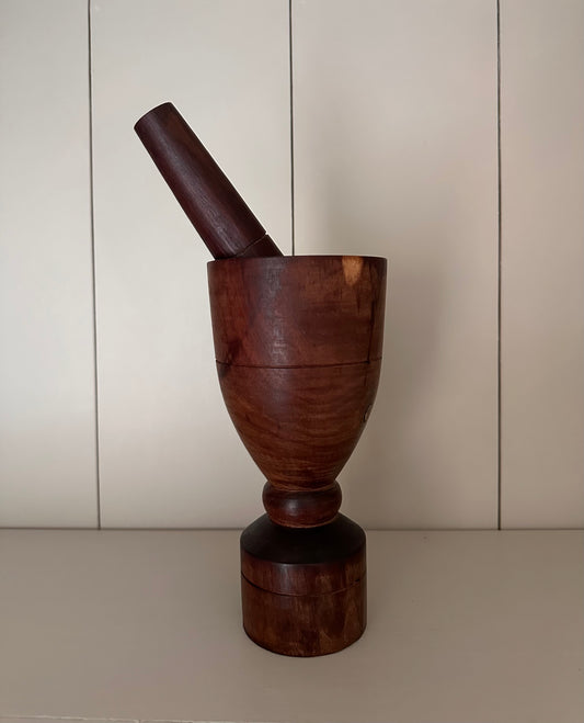 Vintage wooden mortar and pestle.